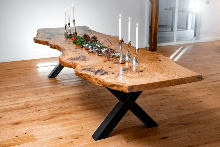 Oak dining table with candlesticks and Christmas decorations